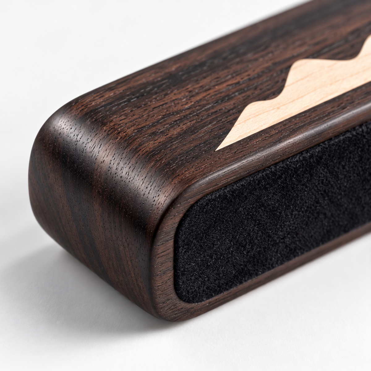 The Distant Mountains — Hand-Carved Ebony Paperweight with Maple Mountain Inlay