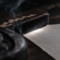 The Distant Mountains — Hand-Carved Ebony Paperweight with Maple Mountain Inlay