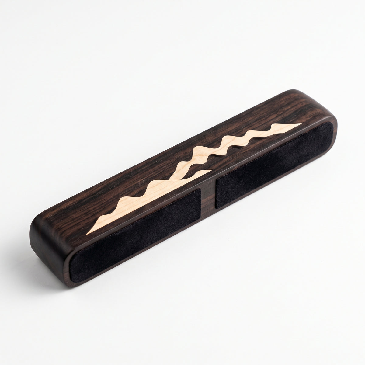 The Distant Mountains — Hand-Carved Ebony Paperweight with Maple Mountain Inlay